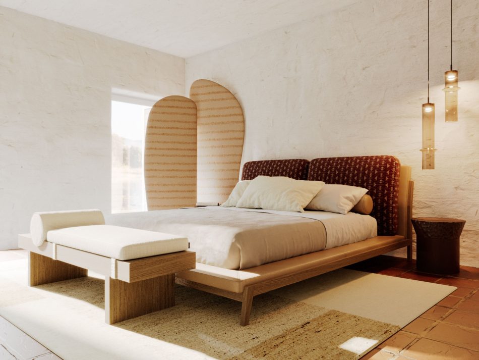 Comporta bedroom featuring the Milos Bed in natural solid wood with a dark patterned furniture upholstery fabric headboard, the Stone Screen's arched woven panels behind, and the Toro Bench extending the composition at the foot. A considered scene of sophisticated bedroom furniture where duality and contrast between textures defines the space.
