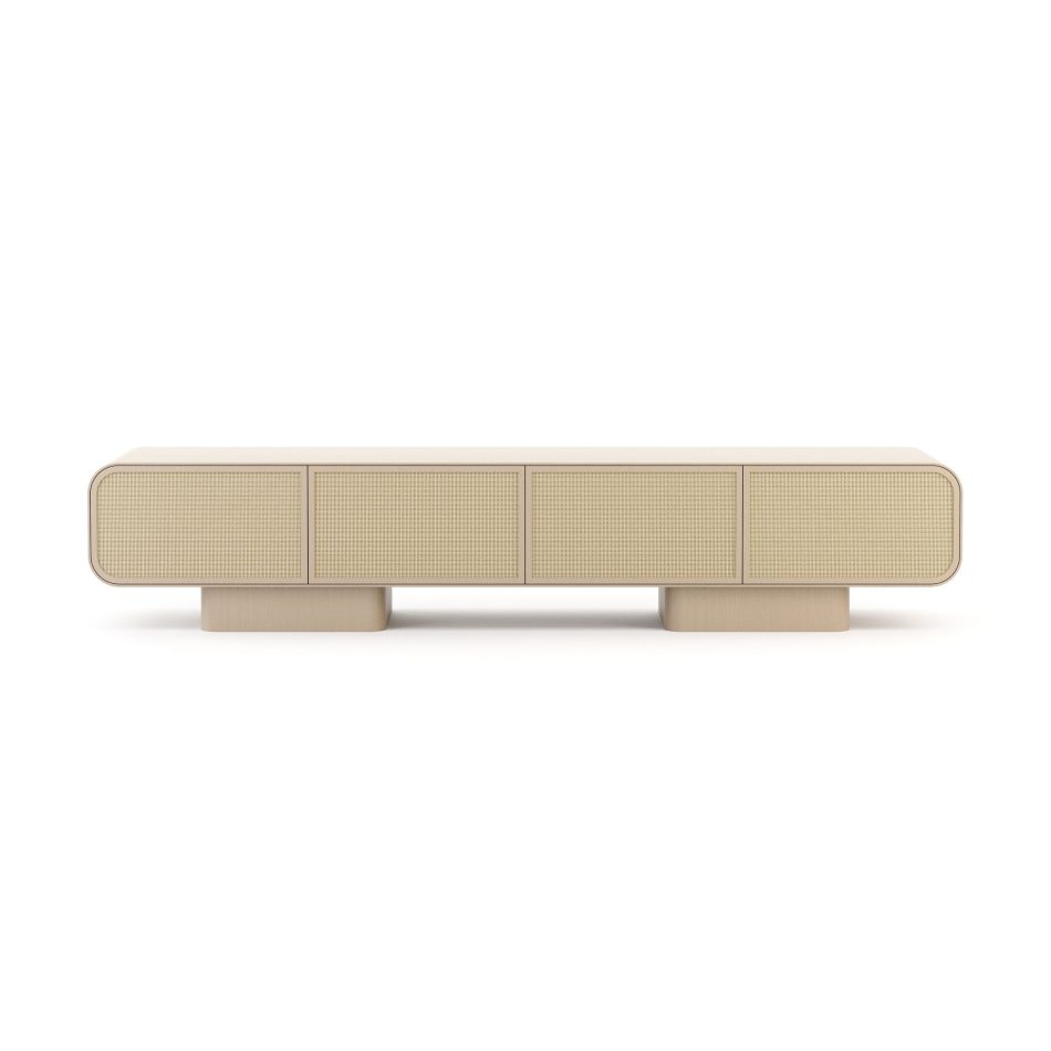 The Natur TV Cabinet is shown front-on against a white background, its four woven cane doors in pale finest wood framing set within a smooth rounded case. Two discreet rectangular bases support the piece, creating visual rhythm beneath its long horizontal form. The design details reflect a piece of contemporary furniture built for authenticity over ornament, ideal as living room furniture for spaces that value permanence.