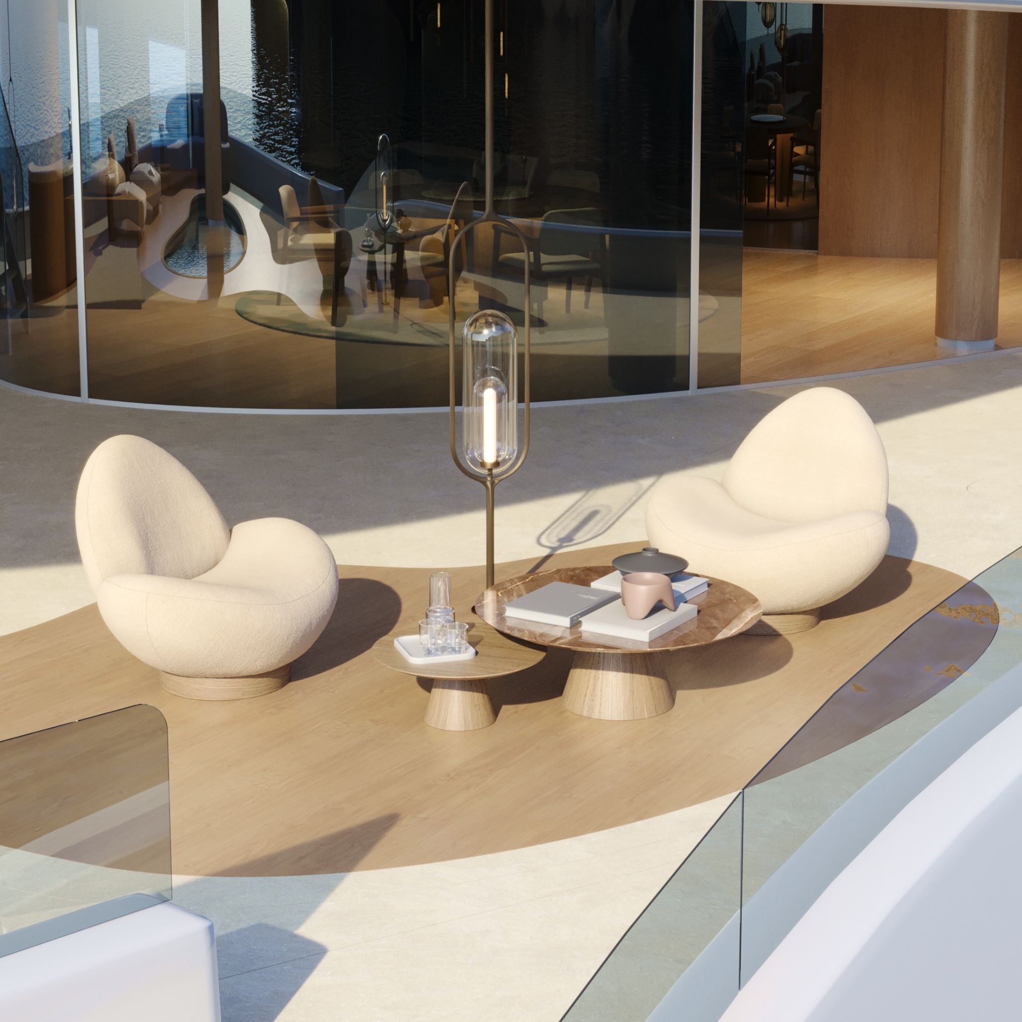 A Outdoor lounge area overlooking water, where two Stone Armchairs in bouclé sit on a curved wood platform beside a pair of round marble-topped side tables and a slender floor lamp. Glass railings and a glimpse of the interior beyond frame the space, showing how the armchair's soft, organic form creates an intimate seating area within a larger, architecturally fluid living room design.