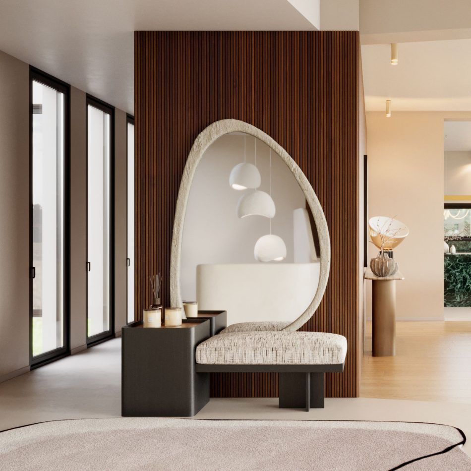 An entrance hall styled with warm wood slat panelling, a dark bench and a set of round pendant lights hanging in the reflection. Anchoring the space is the organic, pebble shaped mirror in textured microconcrete, its tall curved frame standing above the seating like a sculptural focal point. The piece brings a sense of interior design inspiration to the entryway, showing how a mirror for interior design can double as a statement of contemporary furniture within a warm, natural setting.