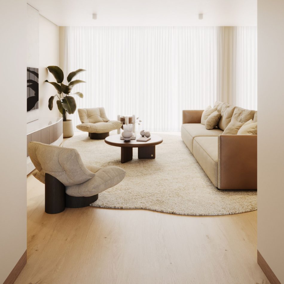 Spacious living room arrangement featuring two Antónia armchair pieces, a sofa, and round coffee table exemplifying modern furniture design and minimalist design.