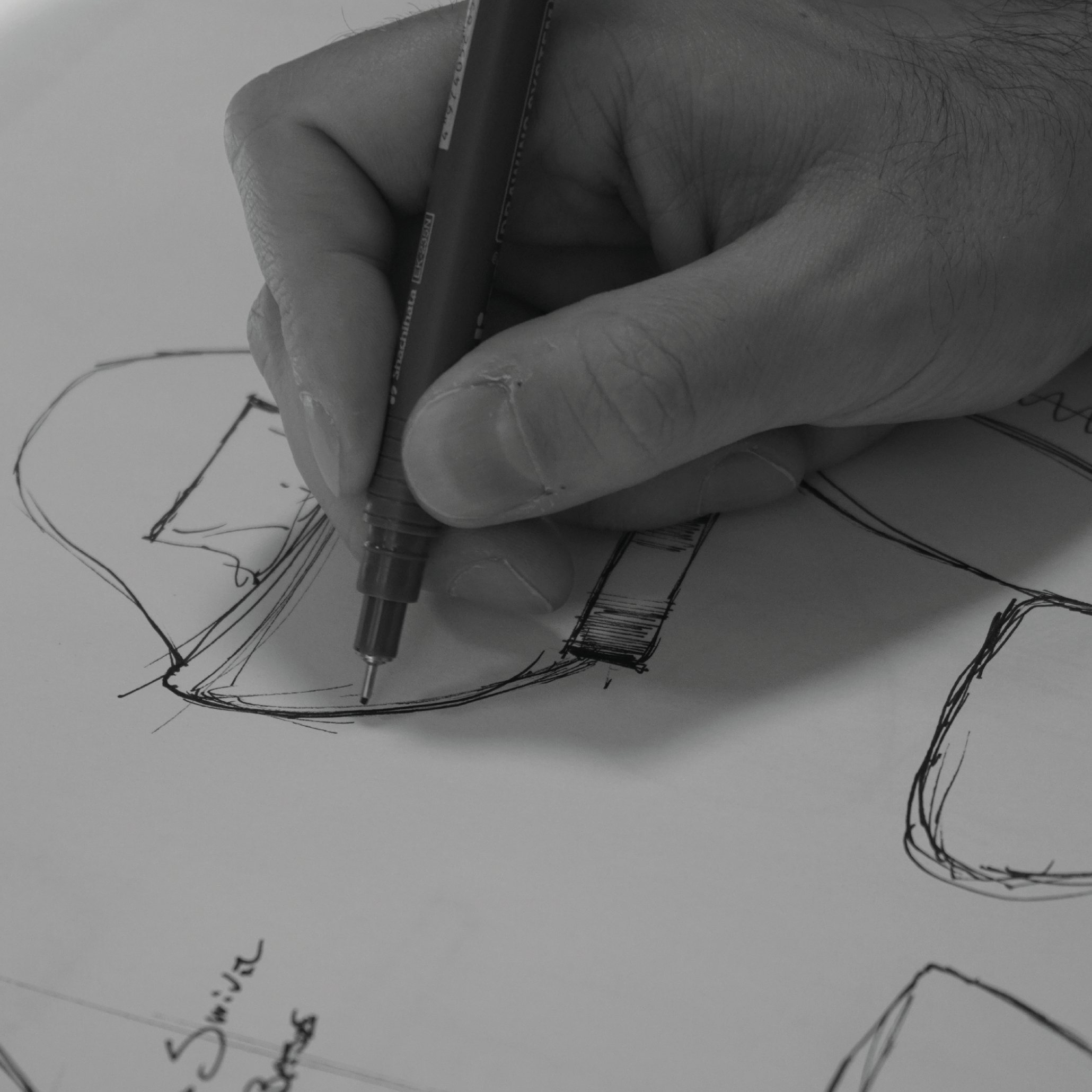 Close-up sketch showing the organic curves and furniture upholstey fabric details of the Stone Armchair, tailored for living room furniture and living room inspiration.